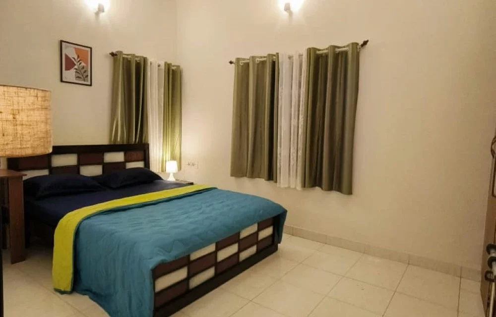 FlickStays Crown Room G1 | Private Room with Attached Washroom in a 3BHK Villa | Koramangala 1st Block, Bangalore